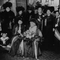 Victoria Woodhull and her sister, Tennessee Claflin in the front row, with fellow suffragists in 1910.